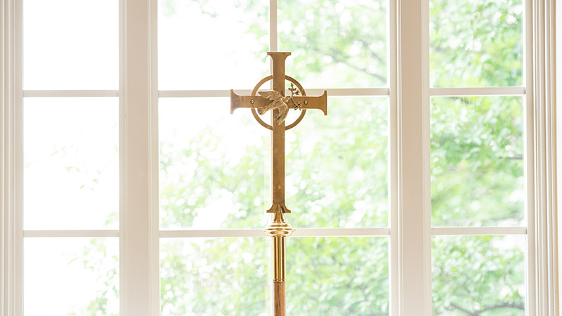 Cross in front of a Window